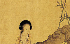 《靓妆倚石图》